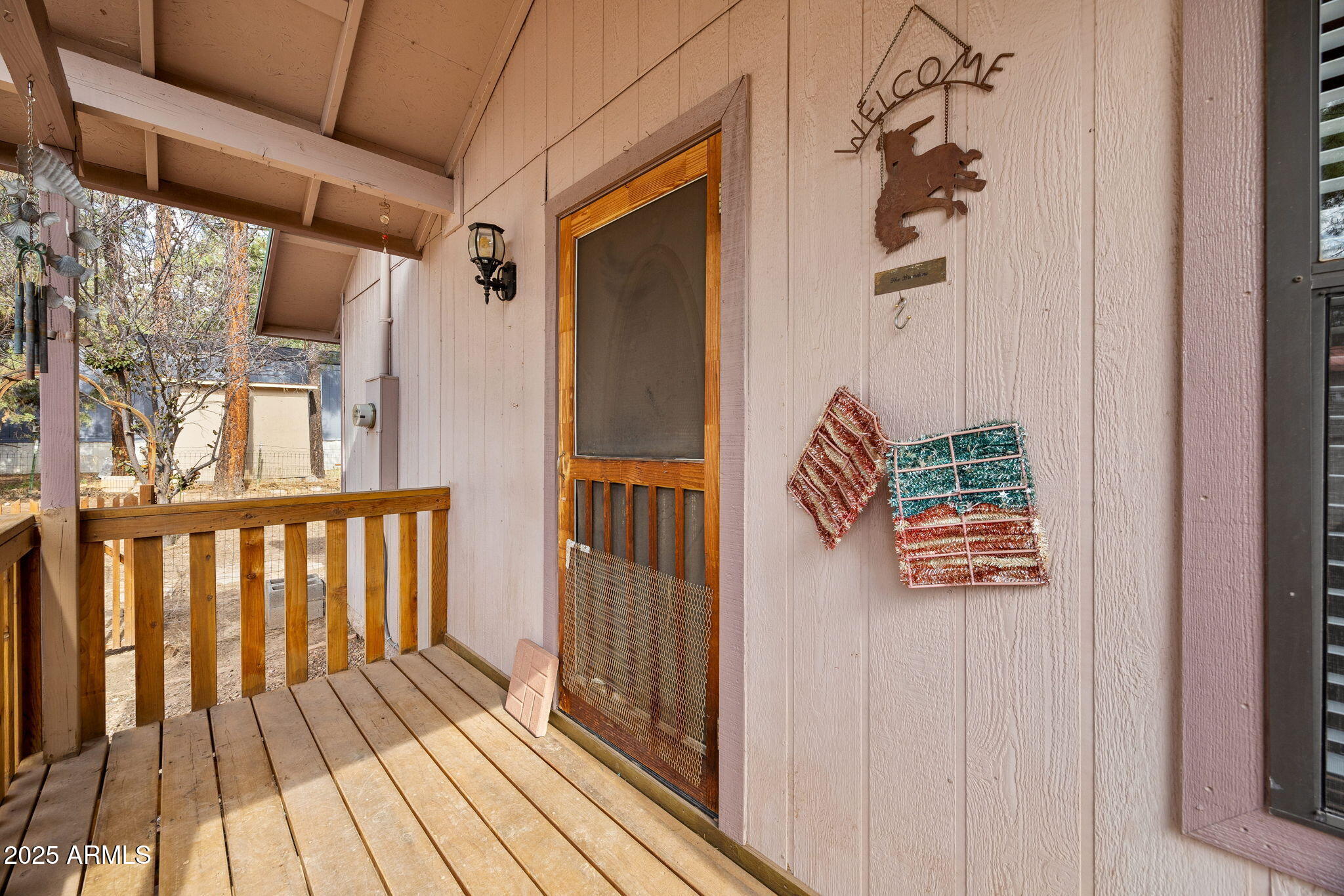 2882 Verde Road Overgaard, AZ 85933 - Photo 6 of 33 a view of a balcony with wooden floor