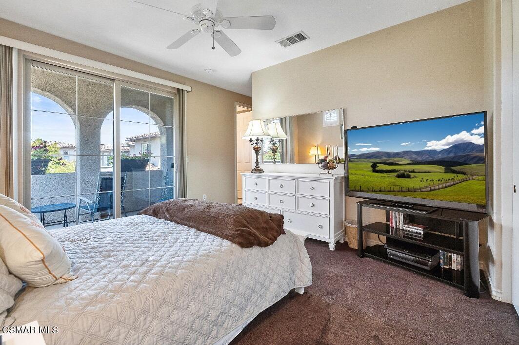 4150 Via Mira Monte Calabasas, CA 91301 - Photo 20 of 41 a bedroom with a bed and a flat tv screen on dresser