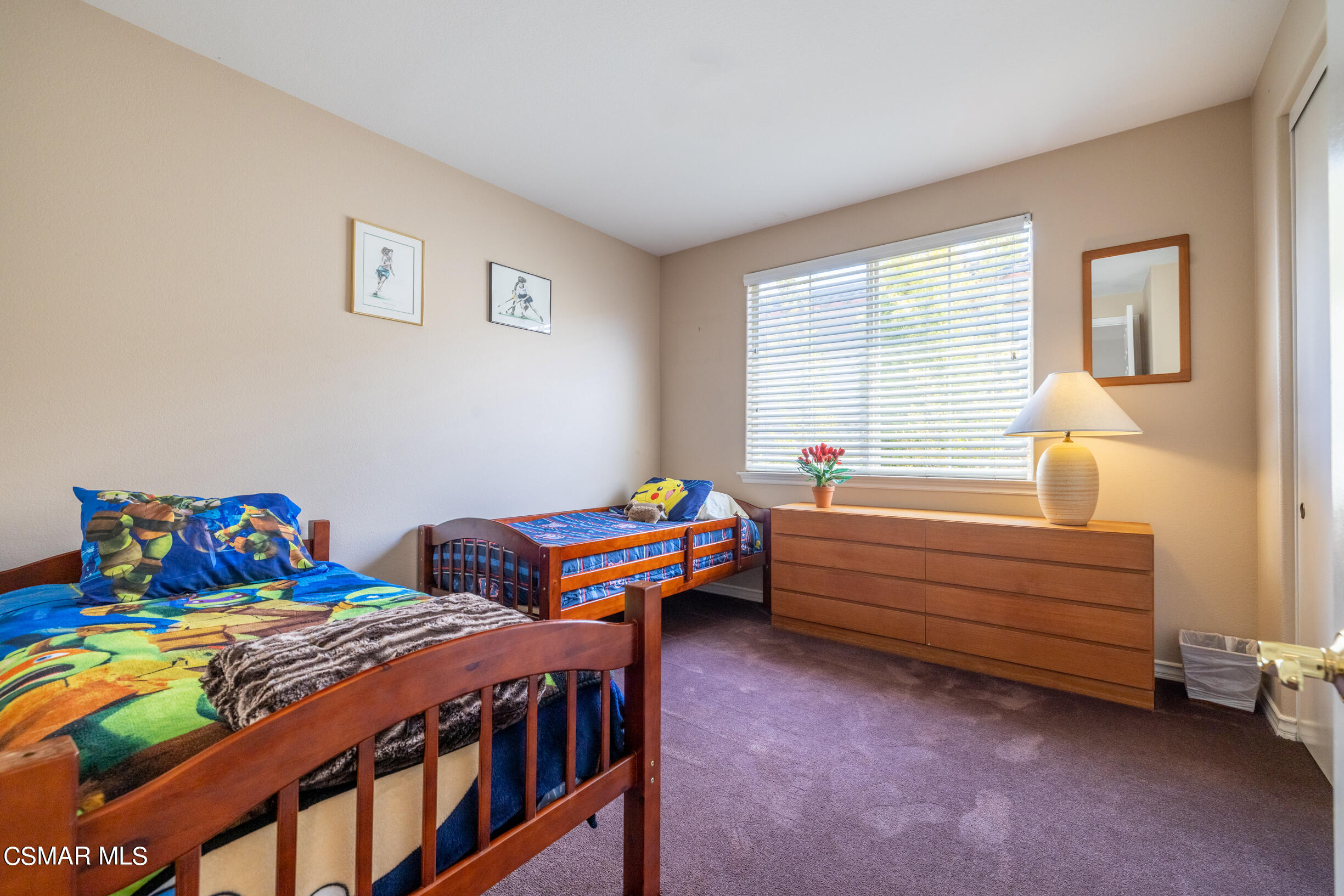 4150 Via Mira Monte Calabasas, CA 91301 - Photo 25 of 41 a bedroom with two beds and a window