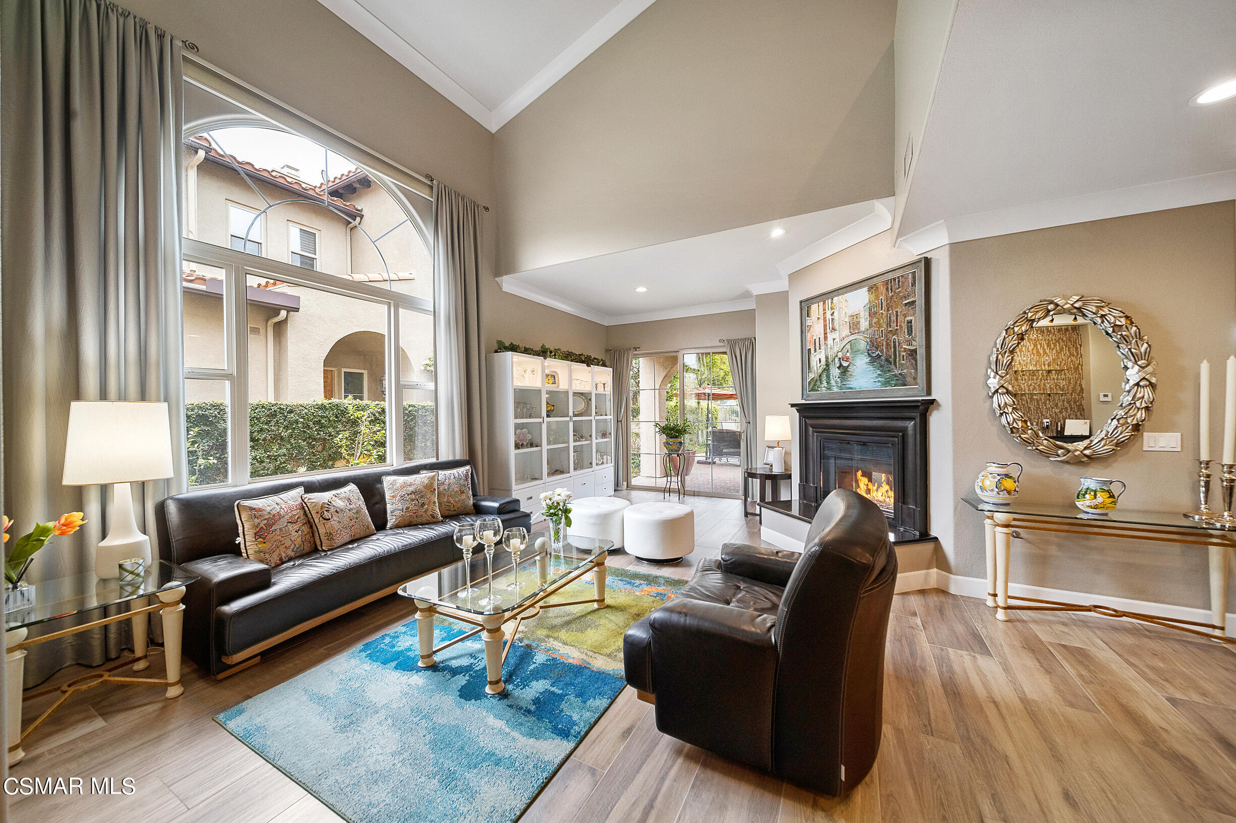 4150 Via Mira Monte Calabasas, CA 91301 - Photo 3 of 41 a living room with furniture and a large window