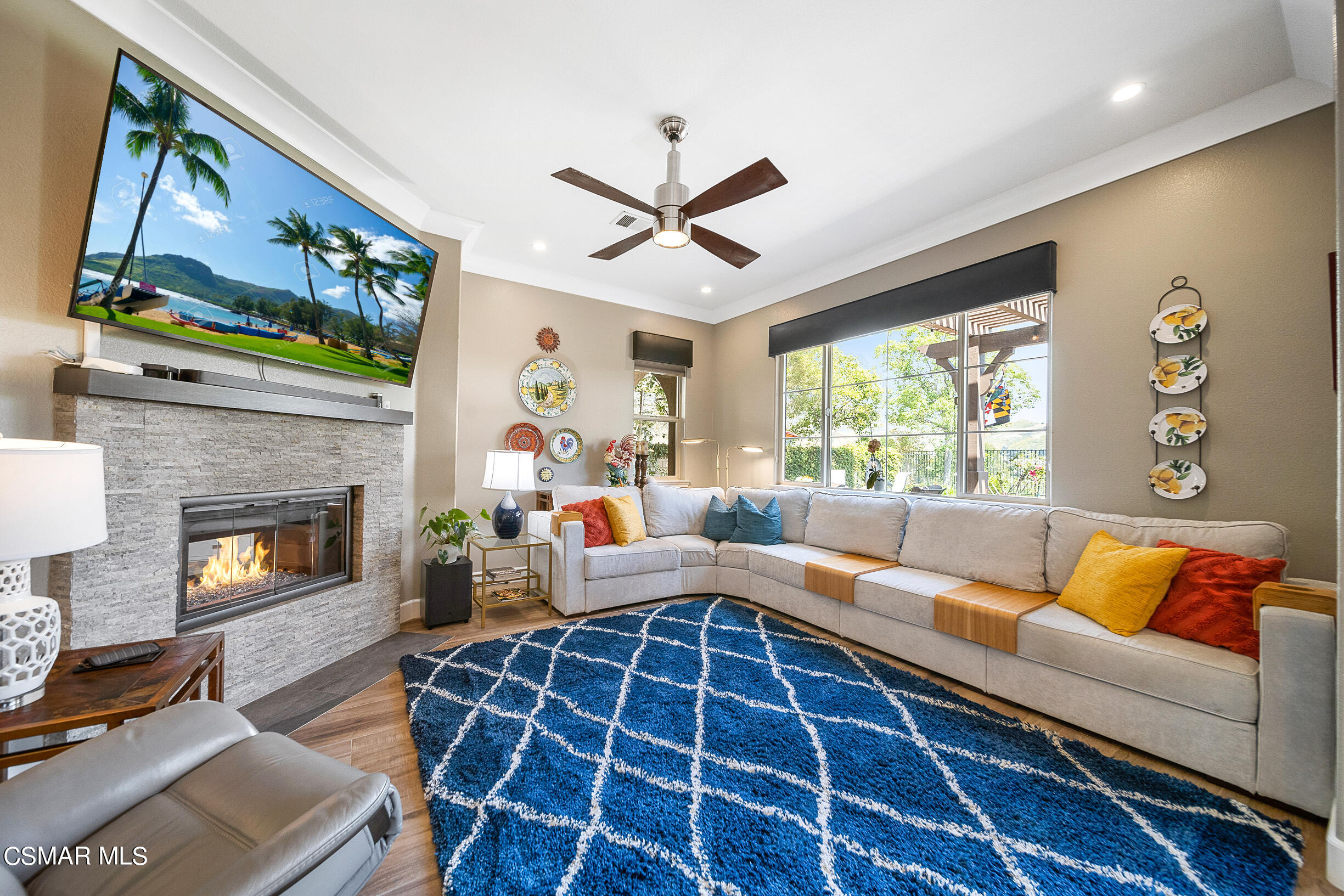 4150 Via Mira Monte Calabasas, CA 91301 - Photo 10 of 41 a living room with furniture fireplace and window