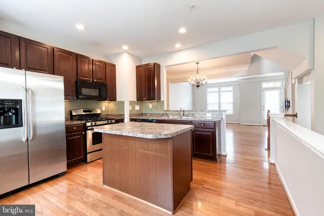 a kitchen with a stove and a sink