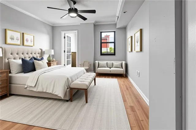 a bedroom with bed and a window