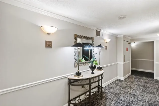 a room with a table and chairs