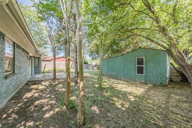 a view of backyard of house
