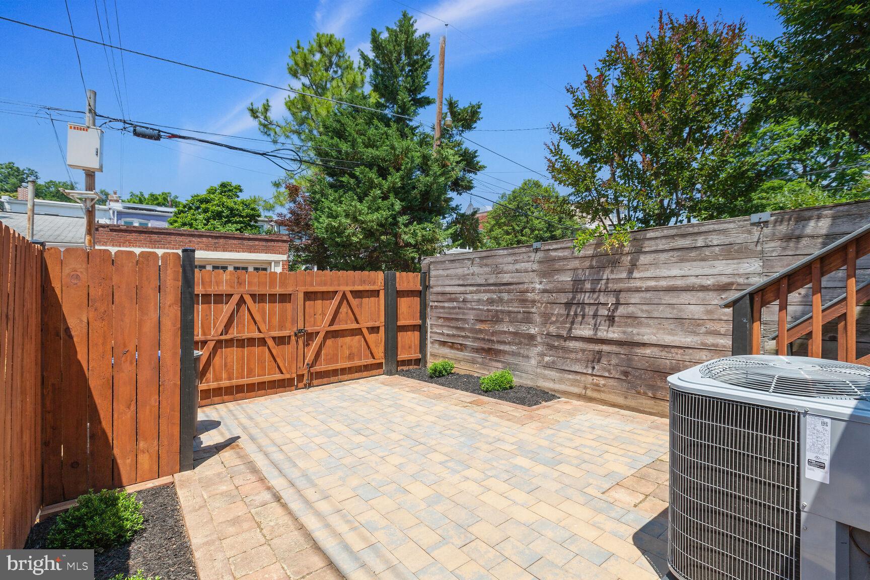 3543 S Street Northwest Washington, DC 20007 - Photo 28 of 31 Large rear deck and hardscaped patio/parking pad