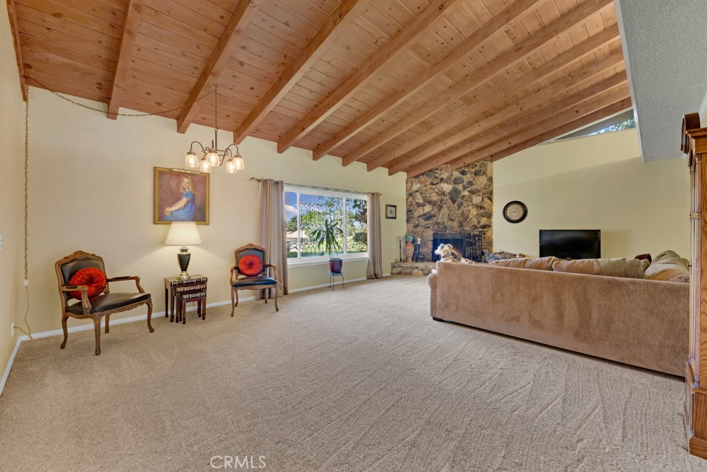 23714 Lawnside Drive Newhall, CA 91321 - Photo 13 of 48 a living room with furniture and a flat screen tv