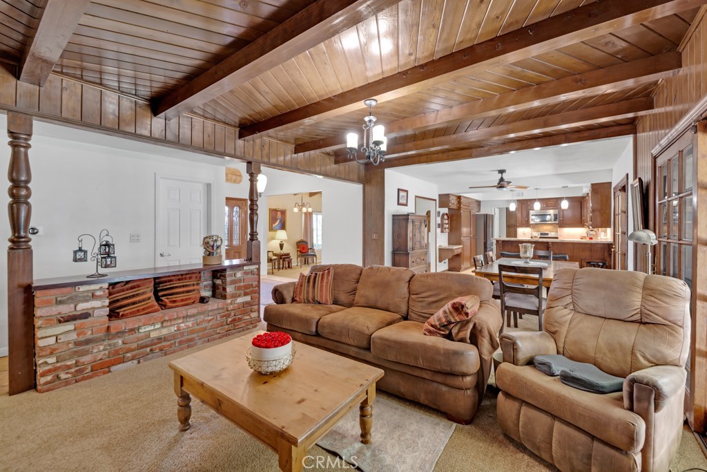 23714 Lawnside Drive Newhall, CA 91321 - Photo 22 of 48 a living room with furniture and a wooden floor
