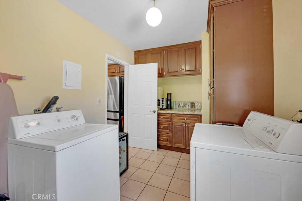 23714 Lawnside Drive Newhall, CA 91321 - Photo 28 of 48 a room with storage and utility