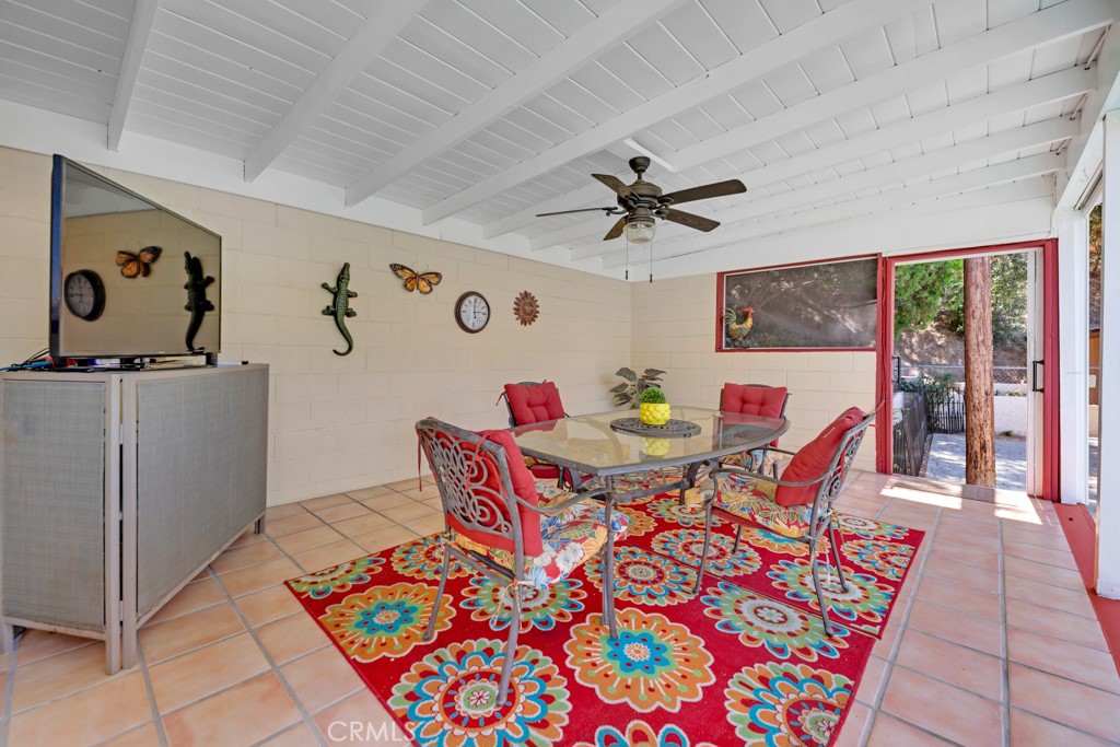 23714 Lawnside Drive Newhall, CA 91321 - Photo 40 of 48 a view of a dining room with furniture