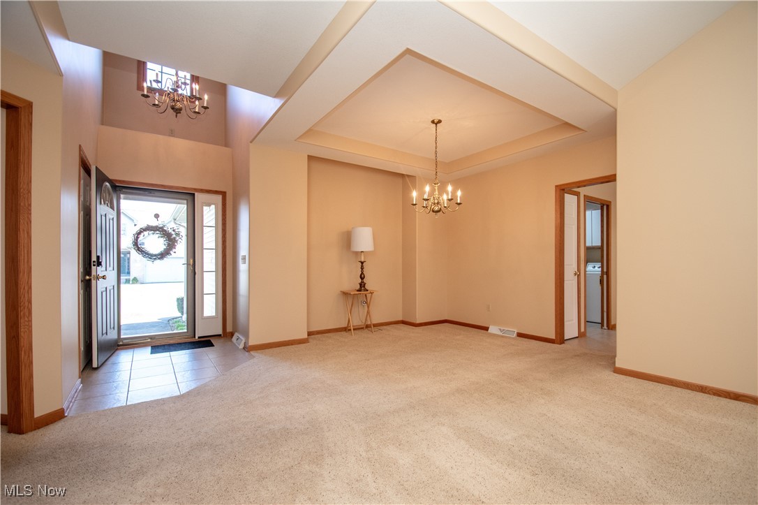 7007 Clingan Road, Unit 64 Youngstown, OH 44514 - Photo 4 of 50 Front foyer with tile leads to Dining Area and living room.