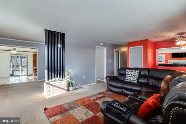 a living room with furniture and a couch