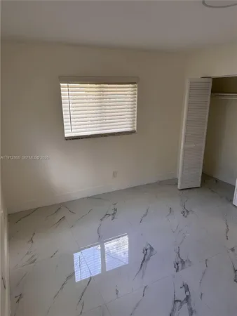 an empty room with closet
