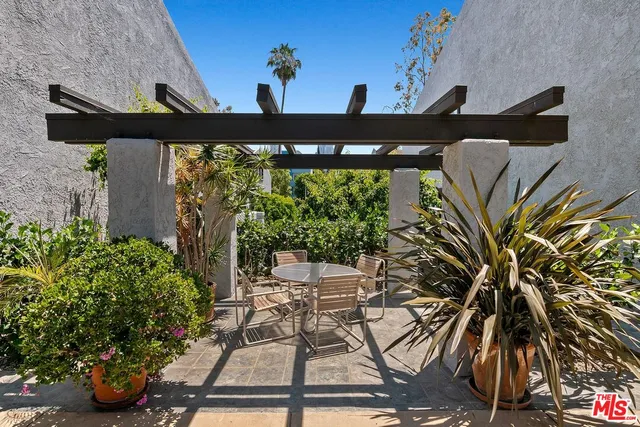 a view of balcony with wooden floor