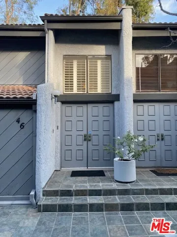 a view of house with outdoor space
