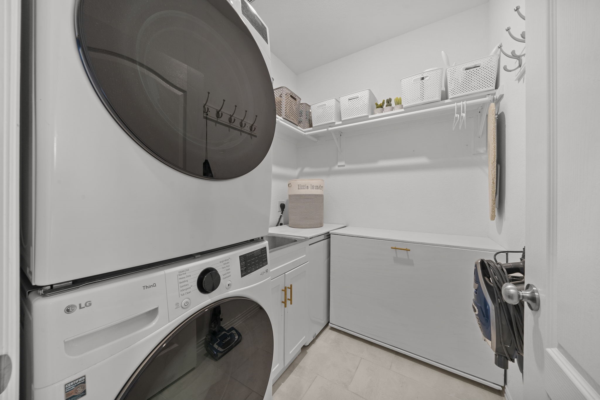 7703 Cowdray Lane Fulshear, TX 77441 - Photo 15 of 15 a utility room with dryer and washer