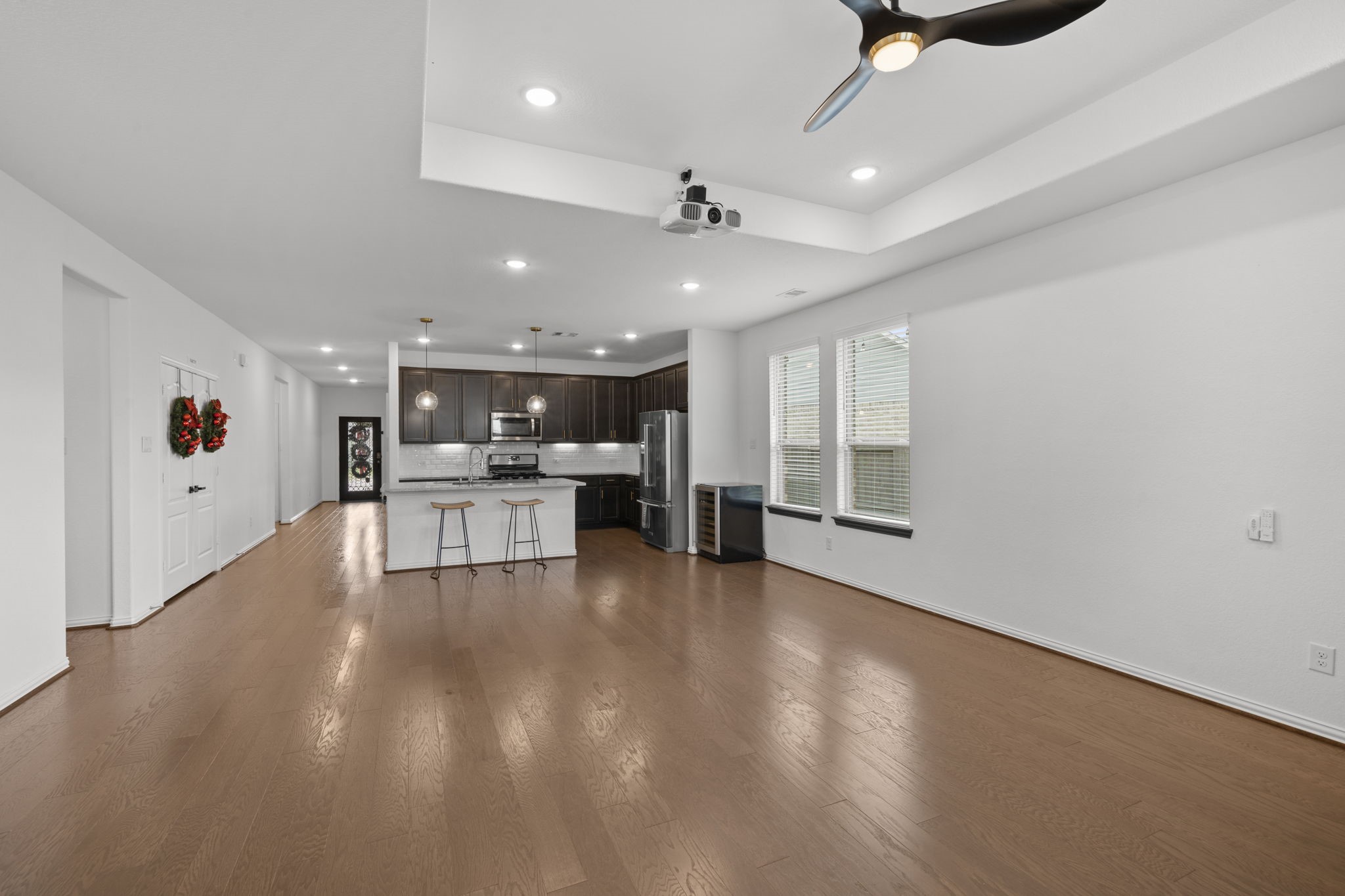 7703 Cowdray Lane Fulshear, TX 77441 - Photo 2 of 15 a view of kitchen with furniture and a window
