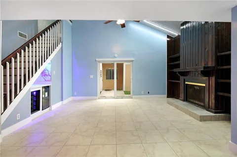 a kitchen with a sink stove and microwave