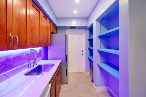 a kitchen that has a stove and a microwave