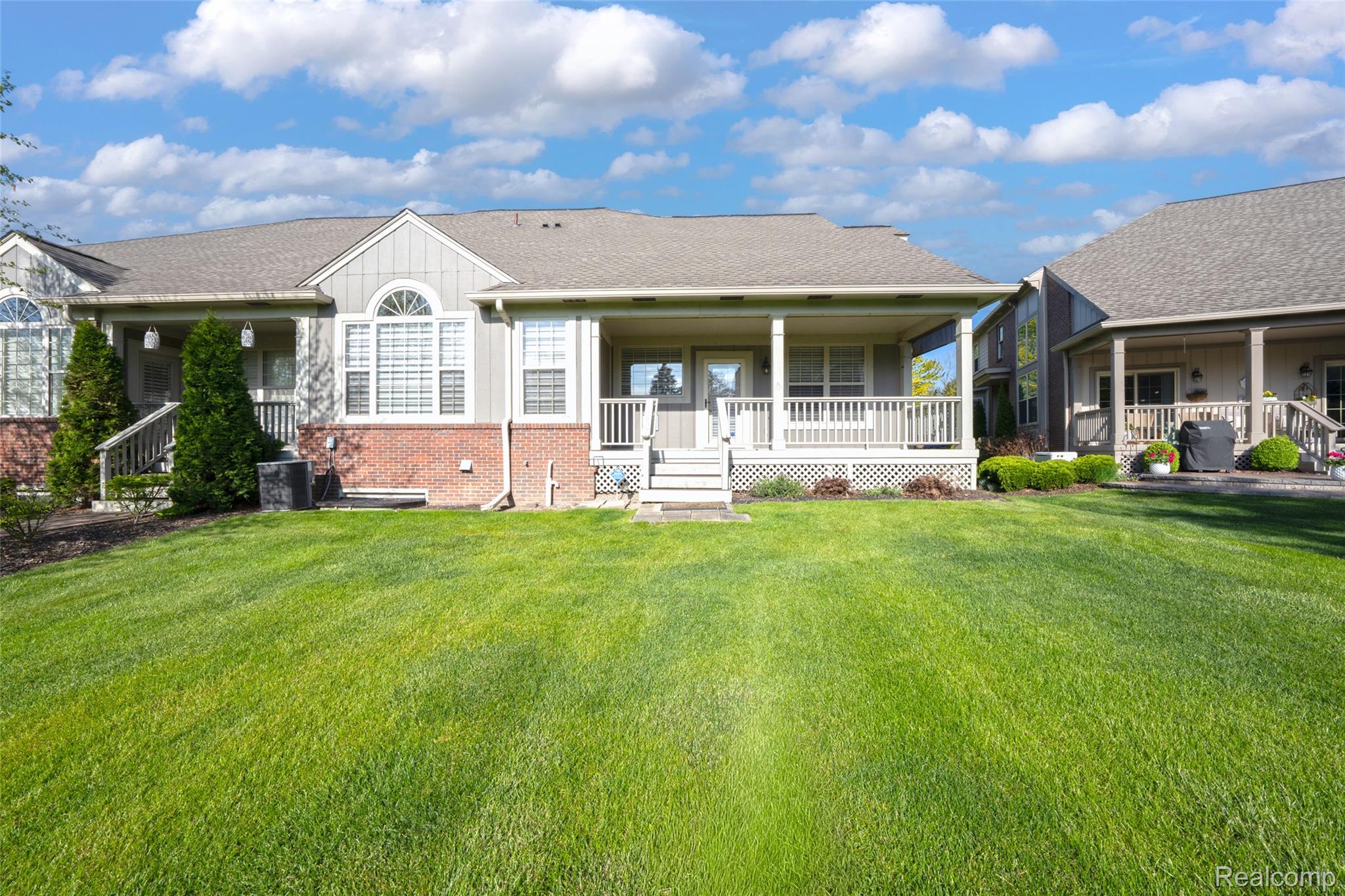 3805 Windingbrook Circle, Unit 22 Rochester, MI 48309 - Photo 60 of 63 Expansive green lawn providing ample outdoor space