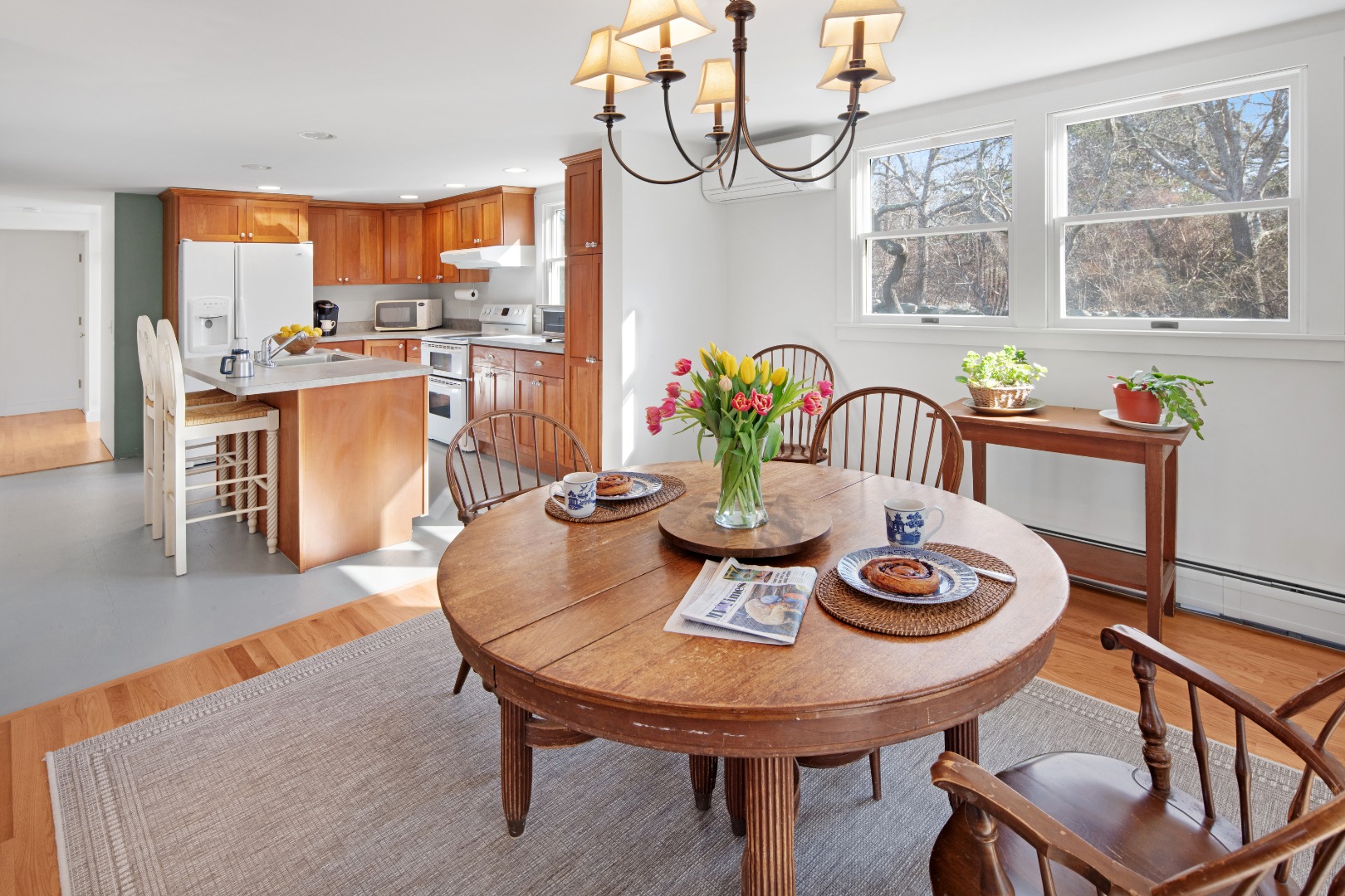 276 S Road Chilmark, MA 02535 - Photo 11 of 39 a view of a dining room with furniture window and wooden floor