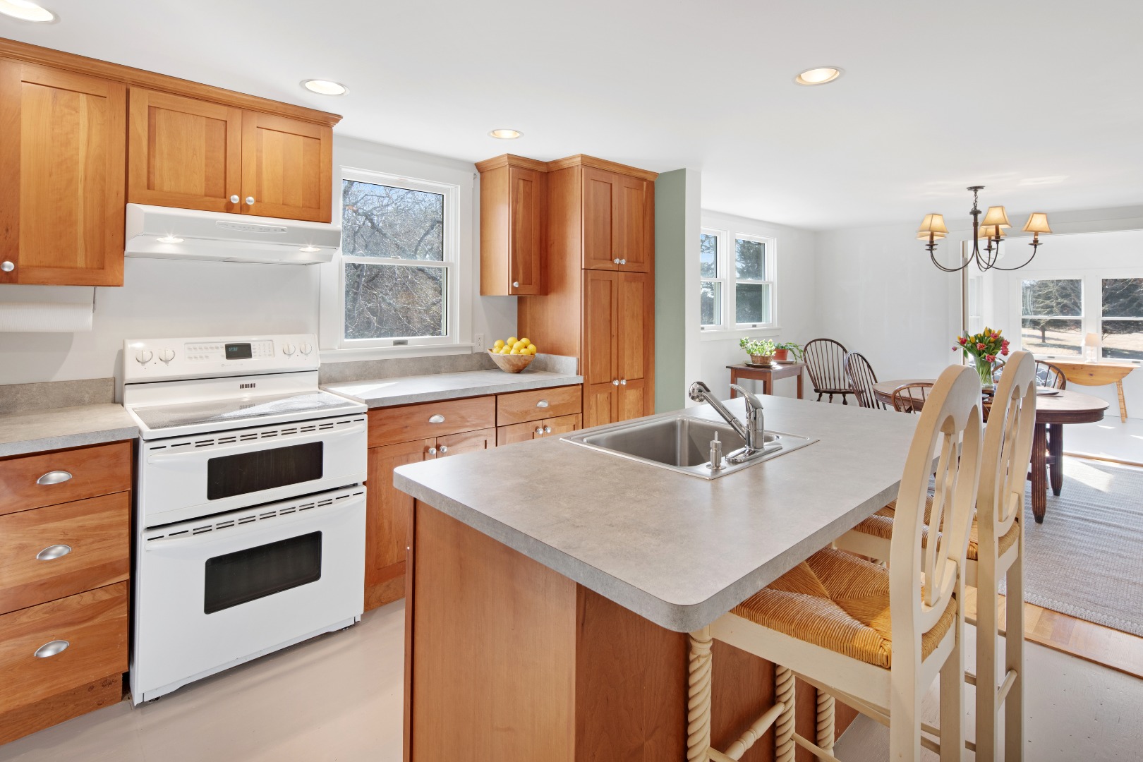 276 S Road Chilmark, MA 02535 - Photo 13 of 39 a kitchen with a stove a sink and a refrigerator