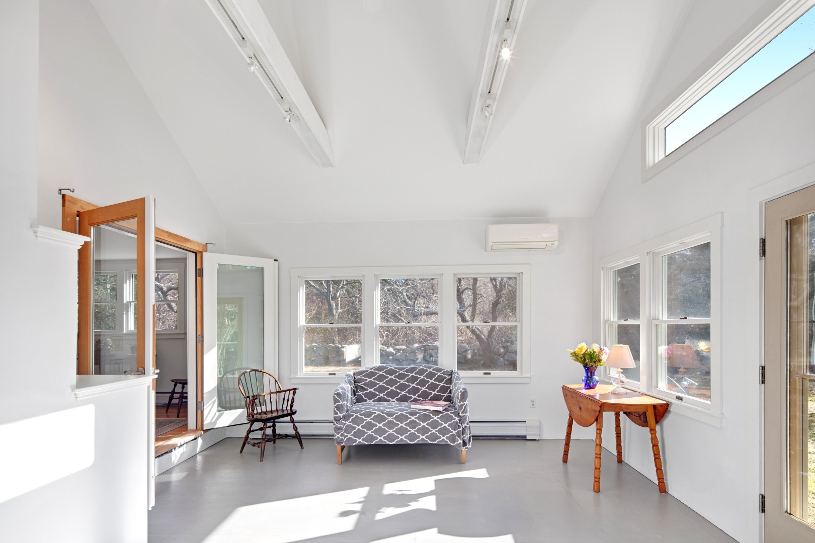 276 S Road Chilmark, MA 02535 - Photo 14 of 39 a living room with furniture and a window