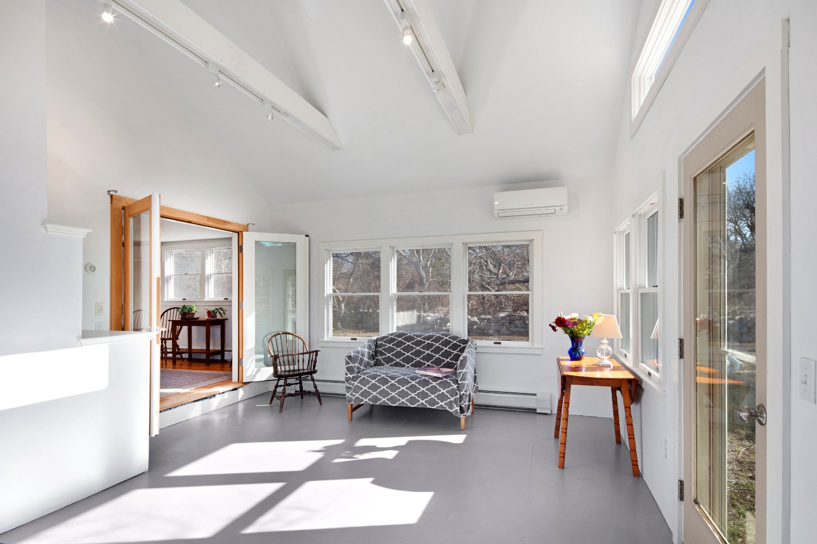 276 S Road Chilmark, MA 02535 - Photo 15 of 39 a living room with furniture and large windows