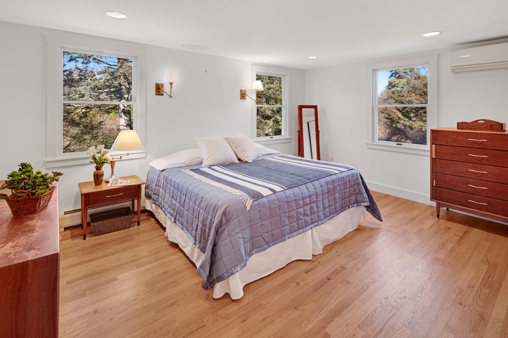 276 S Road Chilmark, MA 02535 - Photo 18 of 39 a bedroom with a bed table and a window