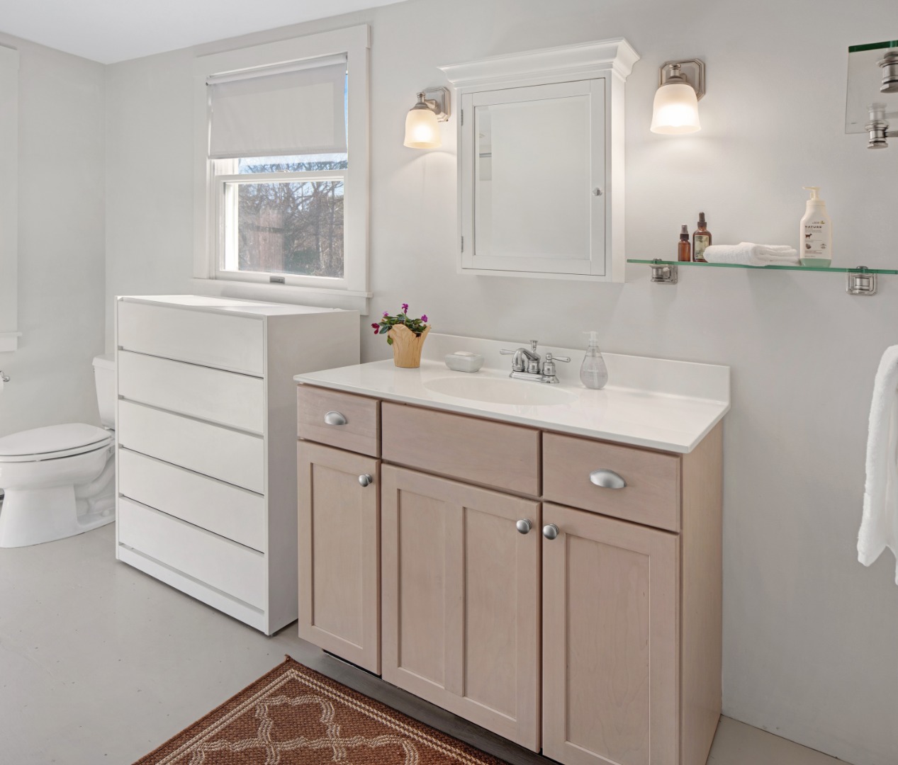 276 S Road Chilmark, MA 02535 - Photo 19 of 39 a bathroom with a sink toilet and mirror