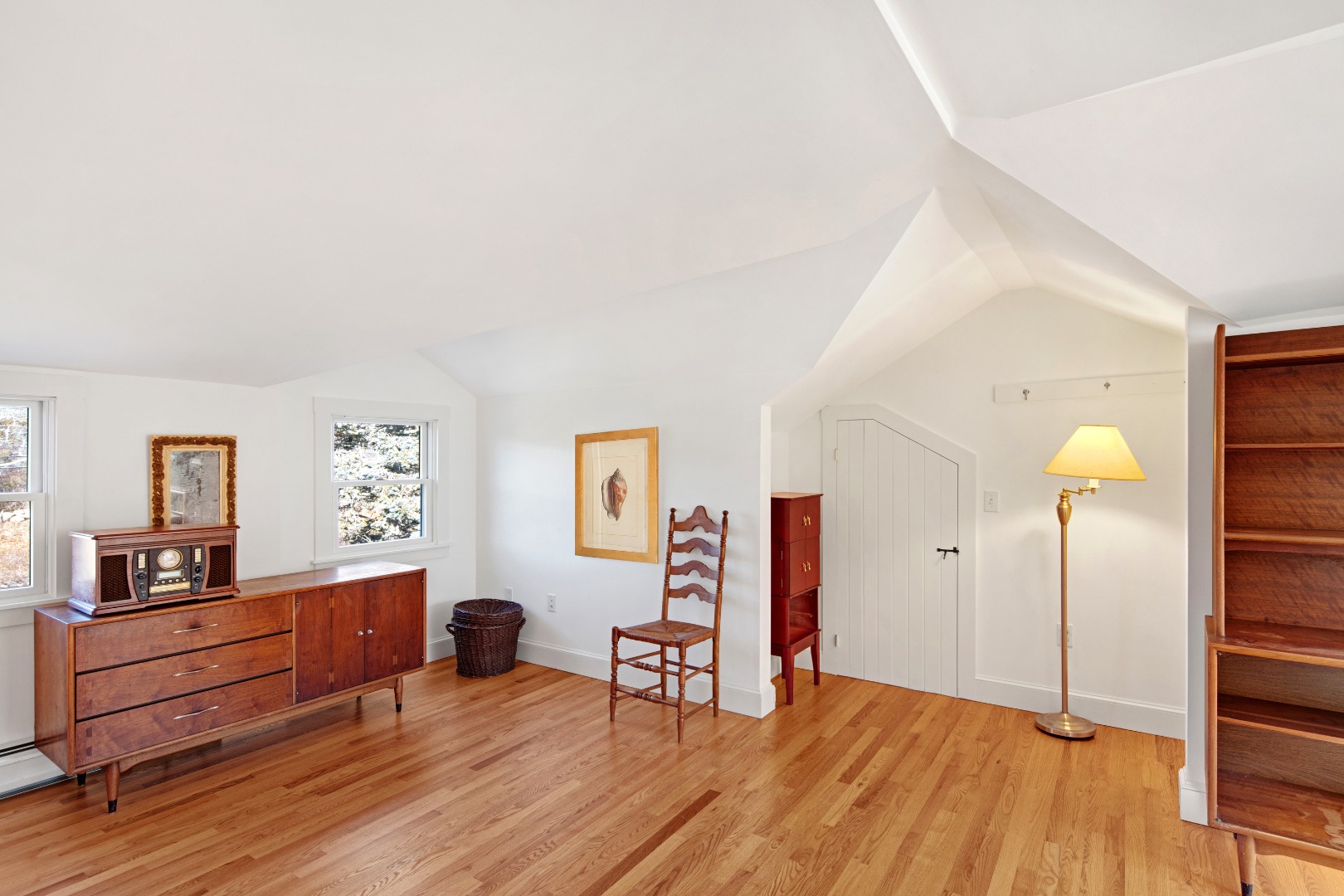 276 S Road Chilmark, MA 02535 - Photo 22 of 39 a view of a workspace with furniture and a wooden floor