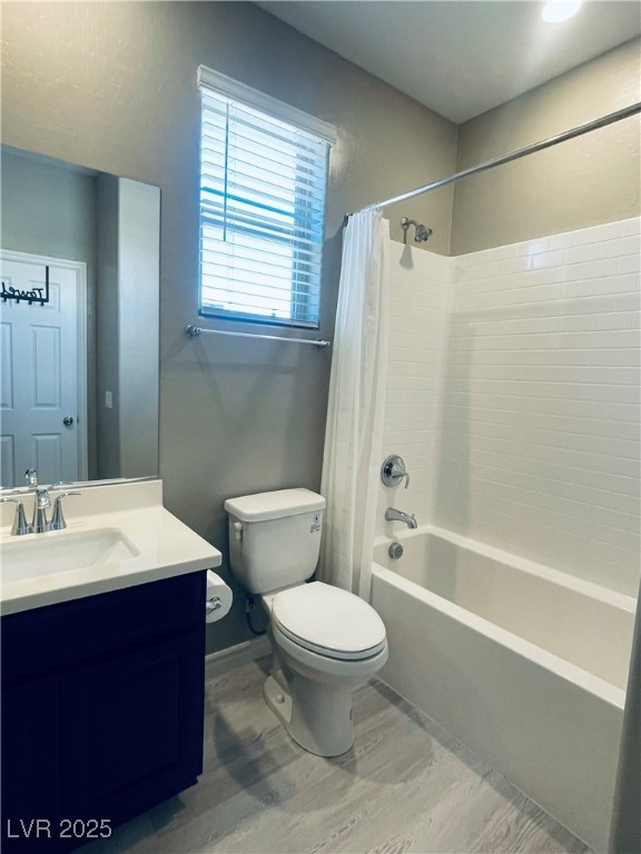930 Bayberry Ridge Street Henderson, NV 89052 - Photo 34 of 40 Bathroom featuring shower / tub combo, vanity, and light wood-style floors