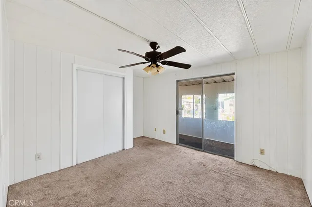 a kitchen with a stove and a refrigerator