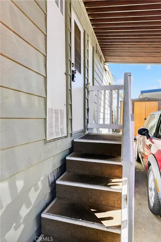 a living room with lots of furniture and a garage