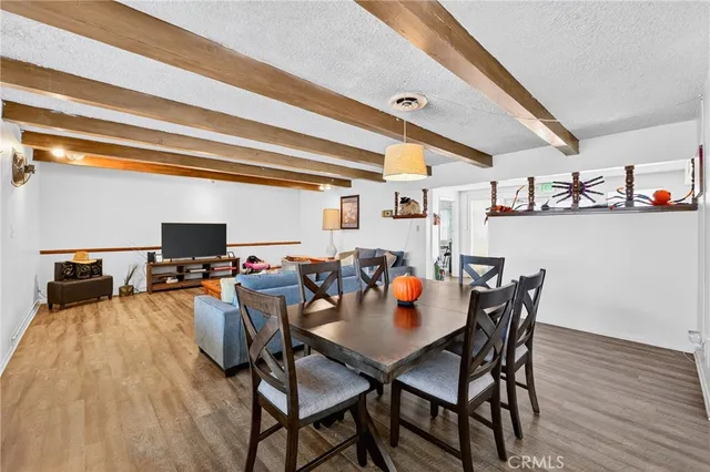 a view of a house with swimming pool and porch