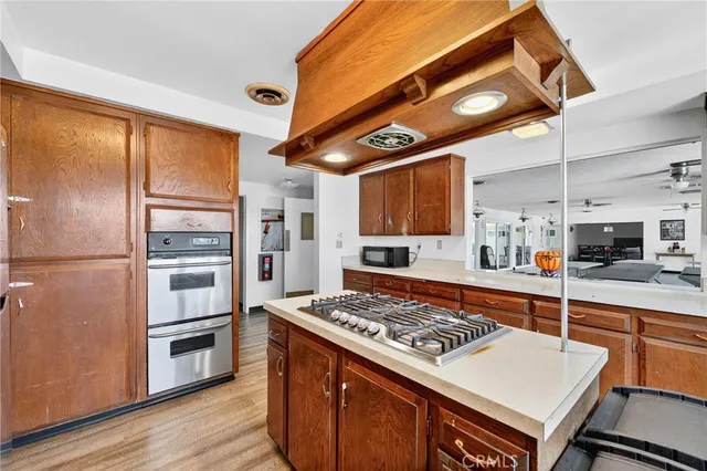 a view of a patio with a table and chairs