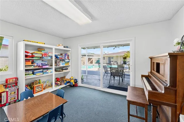 an aerial view of a houses with outdoor space