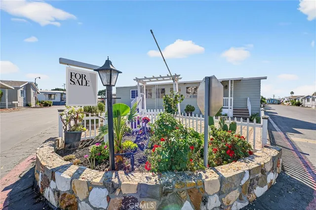 a front view of a house with a garage