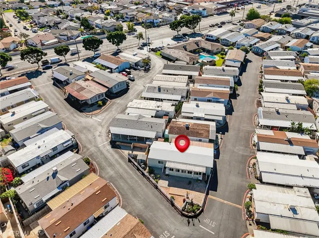 a view of a big room with a ceiling fan