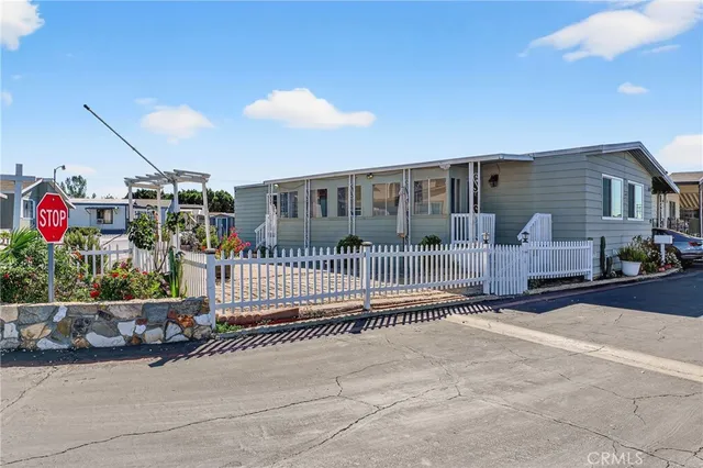 a front view of a house with patio