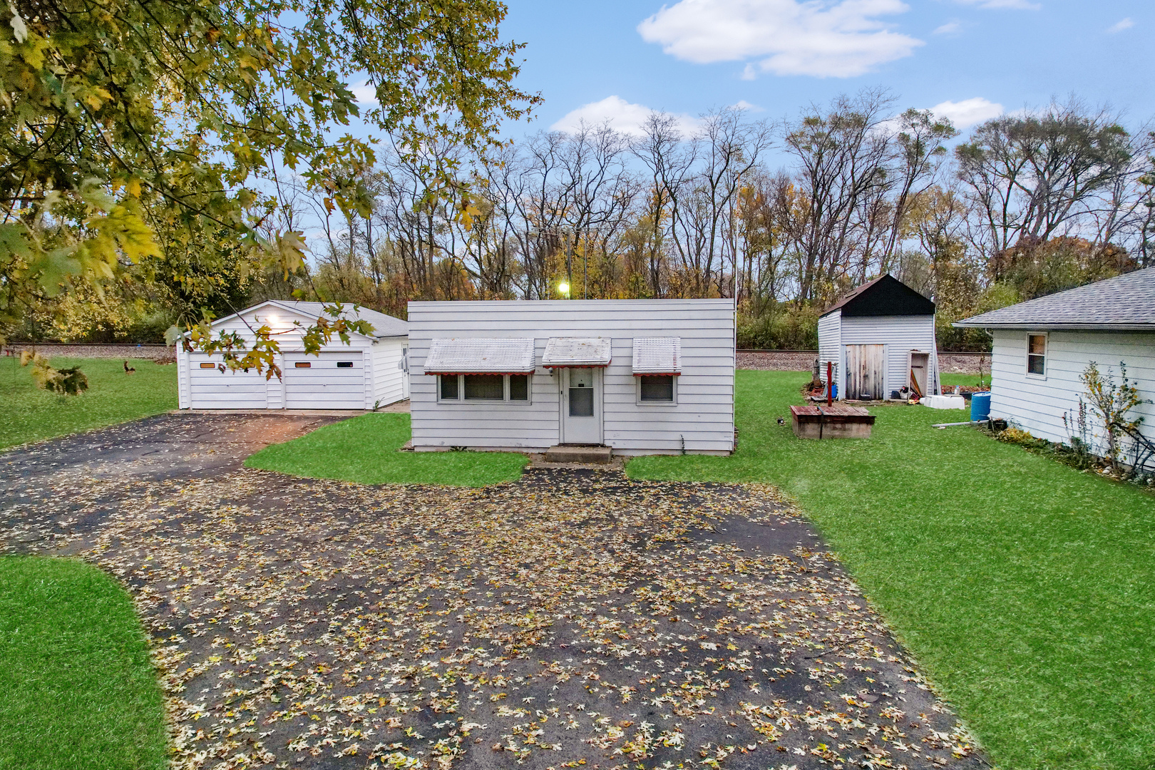 1641 Jericho Road Aurora, IL 60506 - Photo 1 of 17 a front view of a house with garden