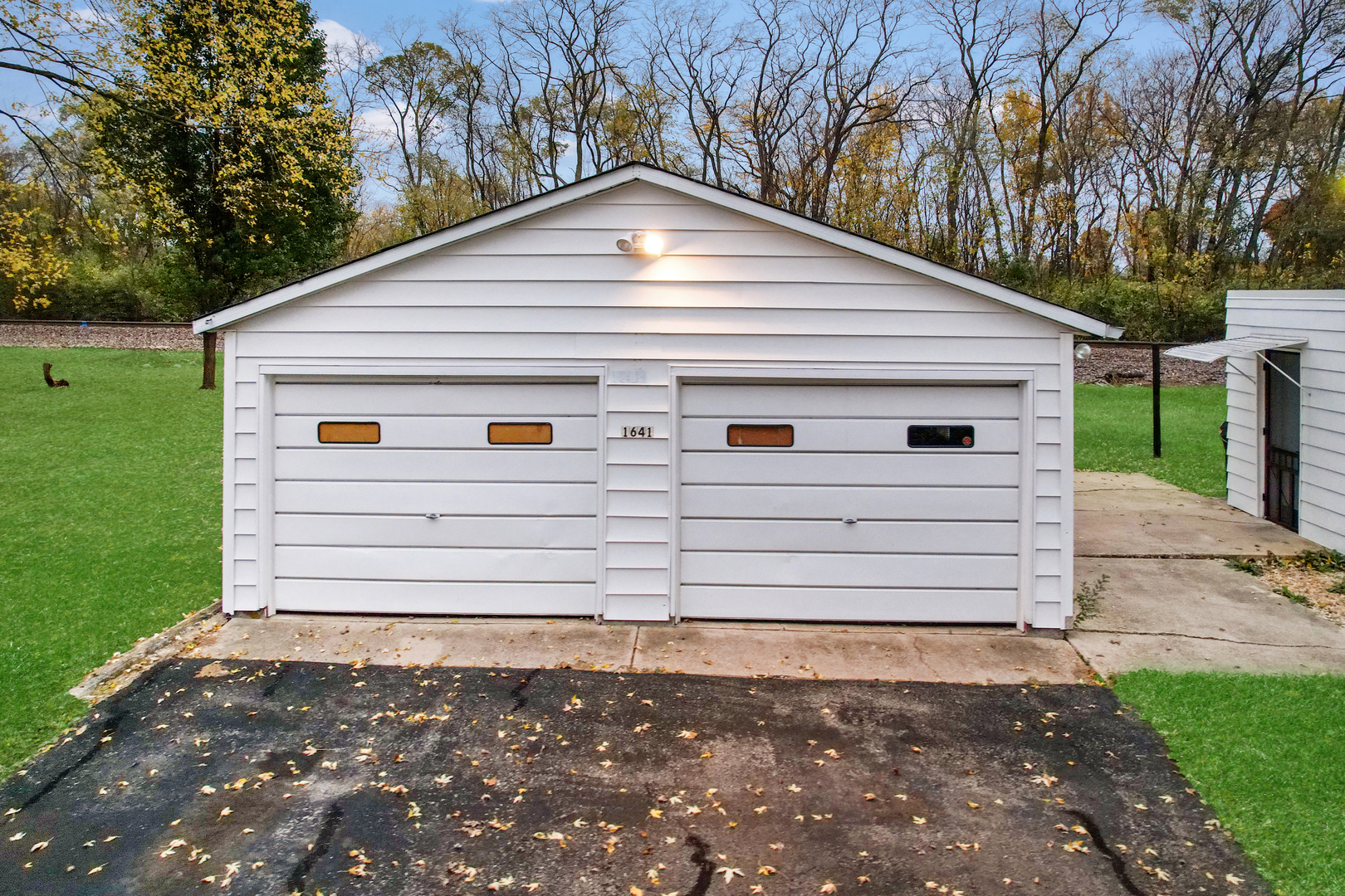 1641 Jericho Road Aurora, IL 60506 - Photo 3 of 17 a view of a house with a yard