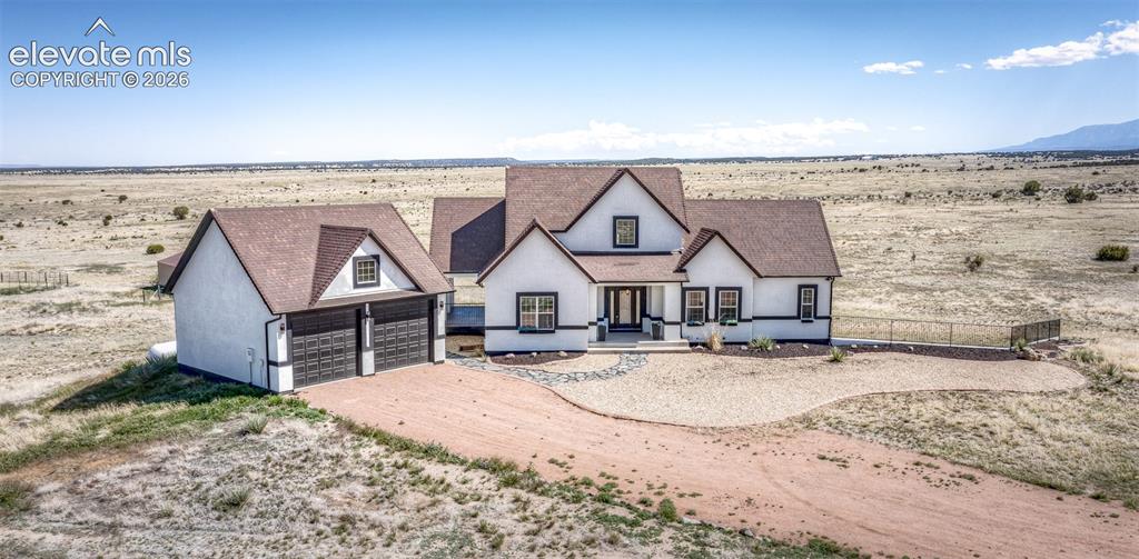 1120 Newton Road Pueblo, CO 81005 - Photo 1 of 46 an aerial view of a house