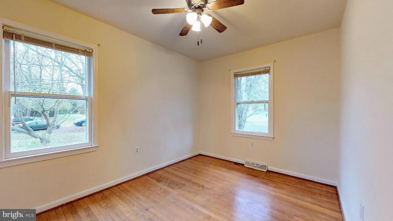 11730 Perry Branch Road Newburg, MD 20664 - Photo 24 of 27 a view of an empty room with wooden floor and a window