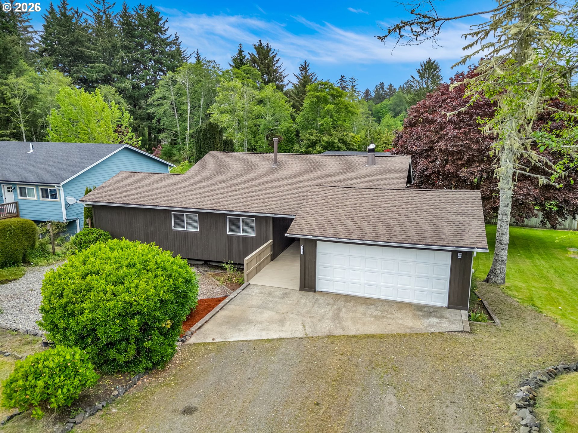 91923 Ridge Road Warrenton, OR 97146 - Photo 34 of 35 front view of a house with a yard