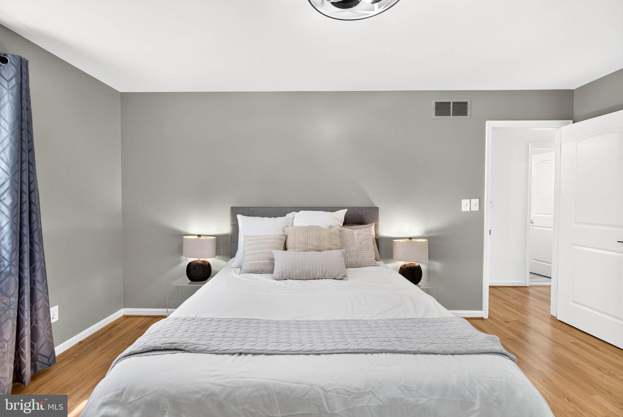 8 Manor Brook Road Monkton, MD 21111 - Photo 27 of 60 Serene bedroom with modern elegance.