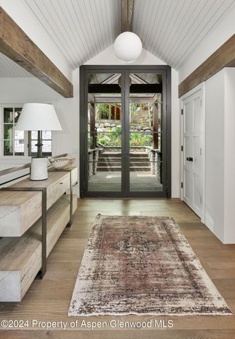 a view of a kitchen with a sink and a stove