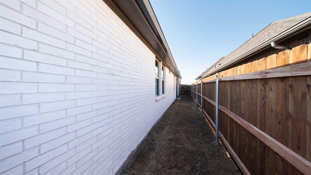 6108 Vester Trail Fate, TX 75087 - Photo 18 of 21 a view of balcony with wooden floor and stairs
