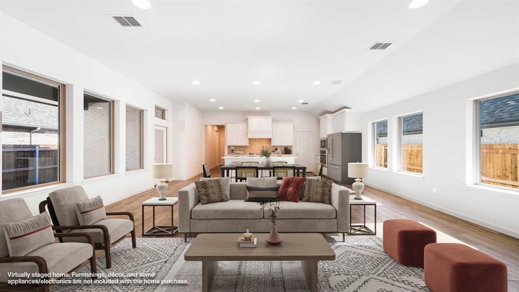 6108 Vester Trail Fate, TX 75087 - Photo 3 of 21 a living room with furniture and a large window
