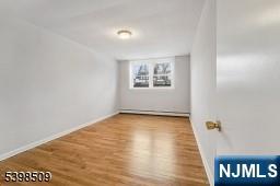 357 Franklin Street Bloomfield, NJ 07003 - Photo 12 of 17 a view of an empty room with a window